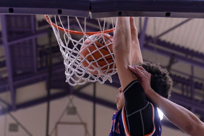 Eastlake’s Caleb Gutierrez (11) dunks the ball during a District 1-6A boys basketball game against Franklin at Franklin High School in El Paso, Texas, on Friday, Jan. 9, 2026.