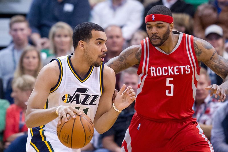 Feb 23, 2016; Salt Lake City, UT, USA; Houston Rockets center Josh Smith (5) defends against Utah Jazz forward Trey Lyles (41) during the first half at Vivint Smart Home Arena. The Jazz won in overtime 117-114. Mandatory Credit: Russ Isabella-USA TODAY Sports