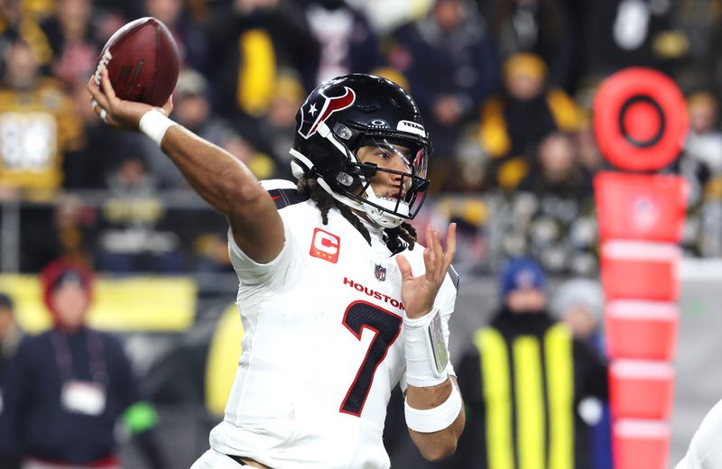 Jan 12, 2026; Pittsburgh, PA, USA; Houston Texans quarterback C.J. Stroud (7) throws during the first half of an AFC Wild Card Round game against the Pittsburgh Steelers at Acrisure Stadium. Mandatory Credit: Charles LeClaire-Imagn Images