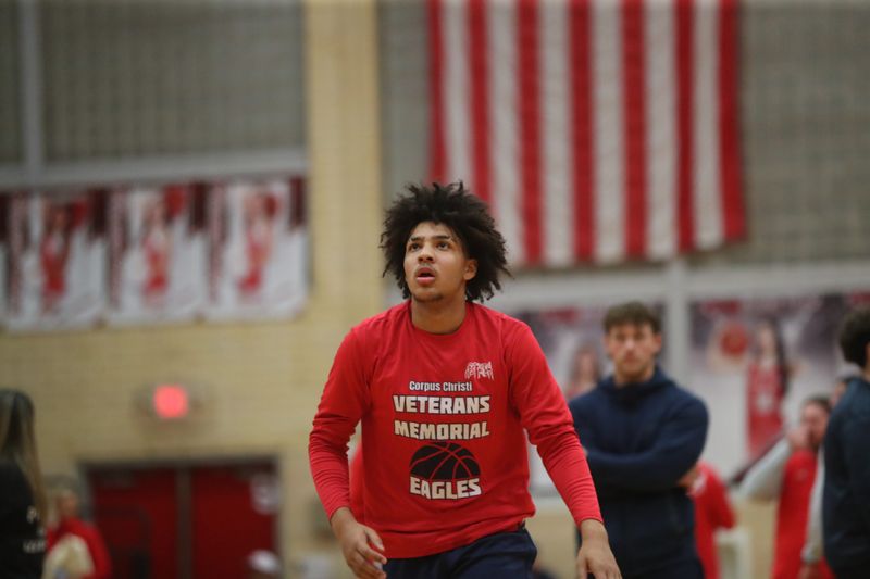 Veterans Memorial's Jaron Couture warms up before the start of Tuesday's District 29-5A game against Ray at the Ray gymnasium.