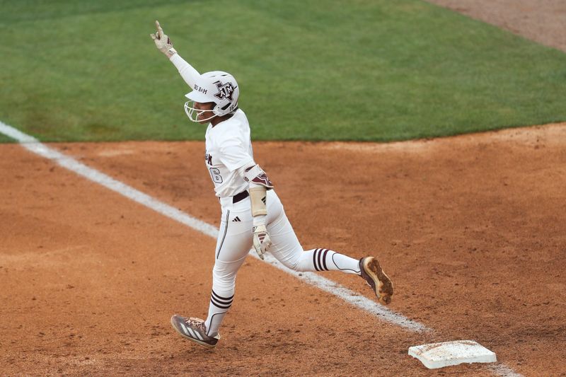 May 9, 2025; Athens, GA, USA; Texas A&M infielder KK Dement (16) reacts to her home run during a game against Texas at Jack Turner Stadium. Mandatory Credit: Mady Mertens-Imagn Images