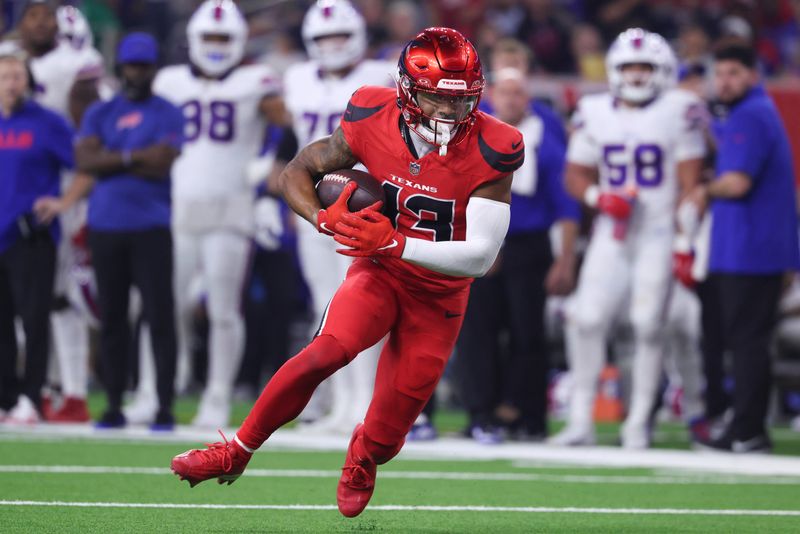 Nov 20, 2025; Houston, Texas, USA; Houston Texans wide receiver Christian Kirk (13) runs with the ball during the game against the Buffalo Bills at NRG Stadium. Mandatory Credit: Troy Taormina-Imagn Images