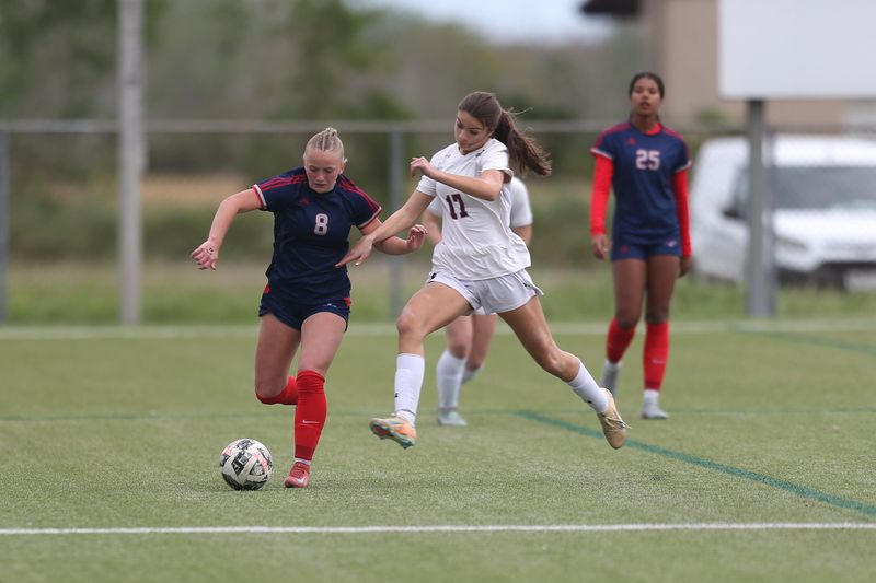 Veterans Memorial's Kate Lovvorn works the ball downfield during a match against San Antonio Davenport at Cabaniss Soccer Field.