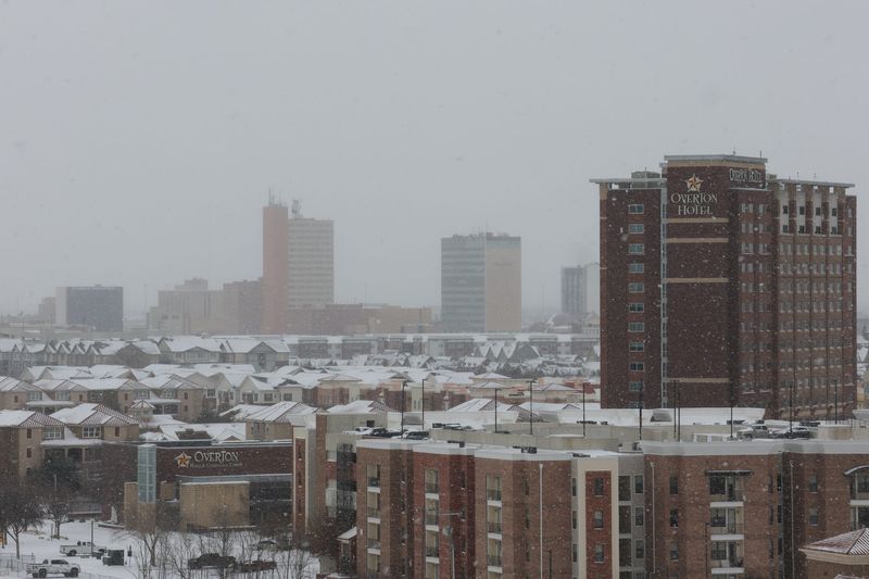 The Downtown Lubbock skyline as it snows as seen on Jan. 25, 2026 in Lubbock, Texas. The City of Lubbock was hit by Winter Storm Fern which brought snow, ice freezing rain and extreme cold temperatures.
