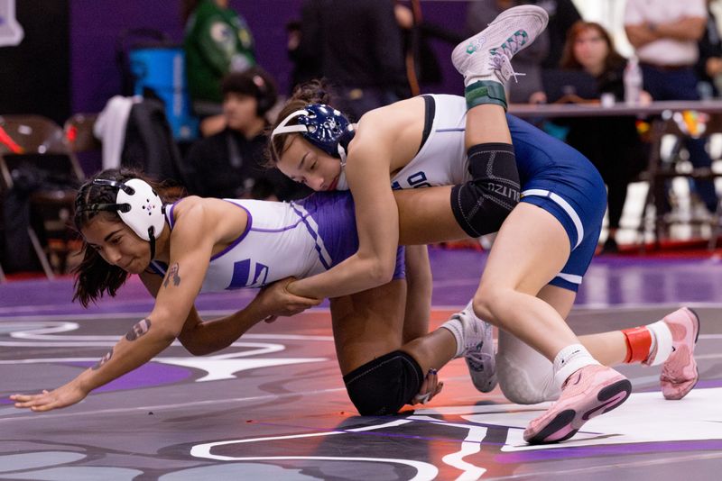 Eastwood’s Hailey Delgado wrestles Franklin’s Paulina Natividad in the 110-pound championship match during the District 1-6A wrestling tournament at Franklin High School in West El Paso, Texas, on Thursday, Jan. 29, 2026.