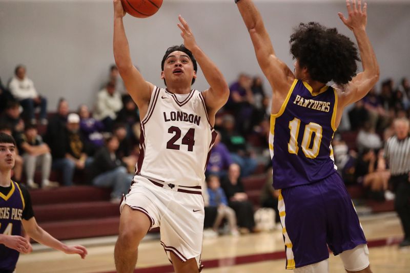 London's Christian Olivares goes up for a layup during Friday's District 29-3A game at London High School on Jan. 30, 2026.