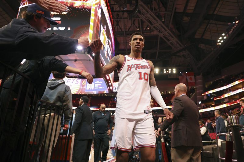 Jan 31, 2026; Houston, Texas, USA; Houston Rockets forward Jabari Smith Jr. (10) walks off the court after the game against the Dallas Mavericks at Toyota Center. Mandatory Credit: Troy Taormina-Imagn Images