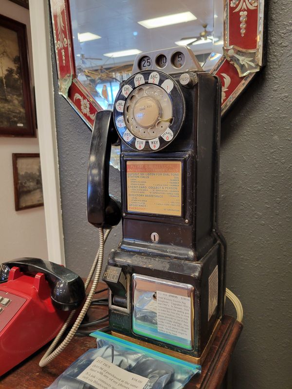 This 1948 Western Electric payphone is available at Dead People's Stuff, 4012 34th St., as seen on Tuesday, Feb. 3, 2026 in Lubbock, Texas. It was reconfigured by Eddie Maddox to work with landlines and can pair cell phones through Bluetooth.