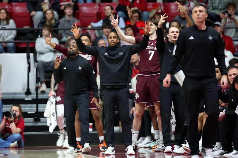 Feb 4, 2026; Tuscaloosa, Alabama, USA; Texas A&M Aggies bench reacts during the first half against the Alabama Crimson Tide at Coleman Coliseum. Mandatory Credit: David Leong-Imagn Images