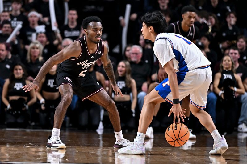 Feb 7, 2026; College Station, Texas, USA; Texas A&M Aggies guard Jacari Lane (5) defends as Florida Gators guard Xaivian Lee (1) controls the ball during the second half at Reed Arena. Mandatory Credit: Maria Lysaker-Imagn Images