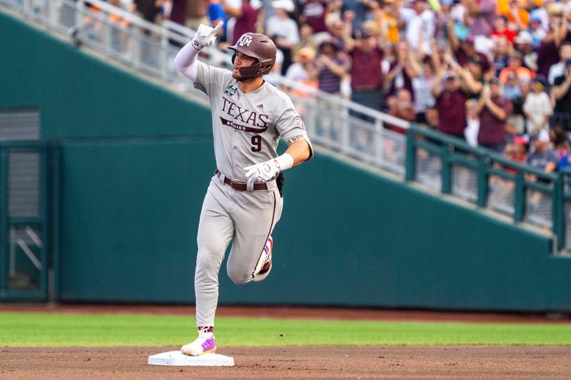 Jun 22, 2024; Omaha, NE, USA; Texas A&M Aggies third baseman Gavin Grahovac (9) celebrates after hitting a home run against the Tennessee Volunteers during the first inning at Charles Schwab Field Omaha. Mandatory Credit: Dylan Widger-USA TODAY Sports