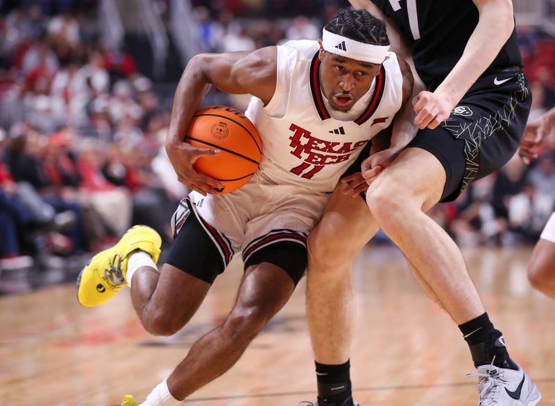 Texas Tech's Jaylen Petty handles the ball against Colorado during a Big 12 Conference men's basketball game, Wednesday, Feb. 11, 2026, in United Supermarkets Arena.