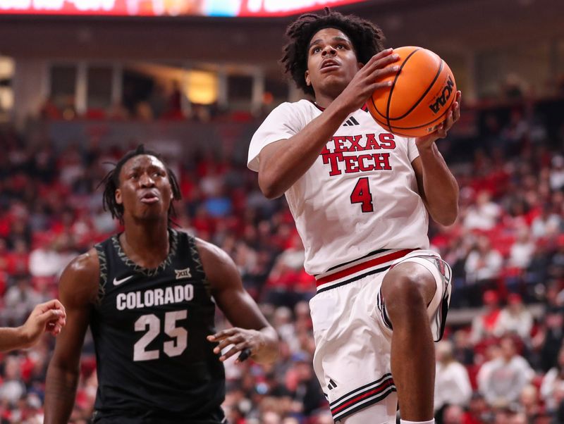 Texas Tech's Christian Anderson moves past Colorado defender Fawaz "Tacko" Ifaola toward the basket during a Big 12 Conference men's basketball game, Wednesday, Feb. 11, 2026, in United Supermarkets Arena.