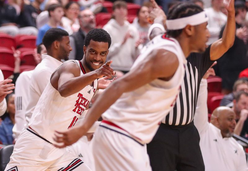 Texas Tech's Donovan Atwell points at Jaylen Petty after hitting a 3-pointer from Petty's pass against Colorado during a Big 12 Conference men's basketball game, Wednesday, Feb. 11, 2026, in United Supermarkets Arena.