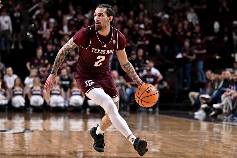 Feb 11, 2026; College Station, Texas, USA; Texas A&M Aggies guard Pop Isaacs (2) dribbles the ball during the second half against the Missouri Tigers at Reed Arena. Mandatory Credit: Maria Lysaker-Imagn Images
