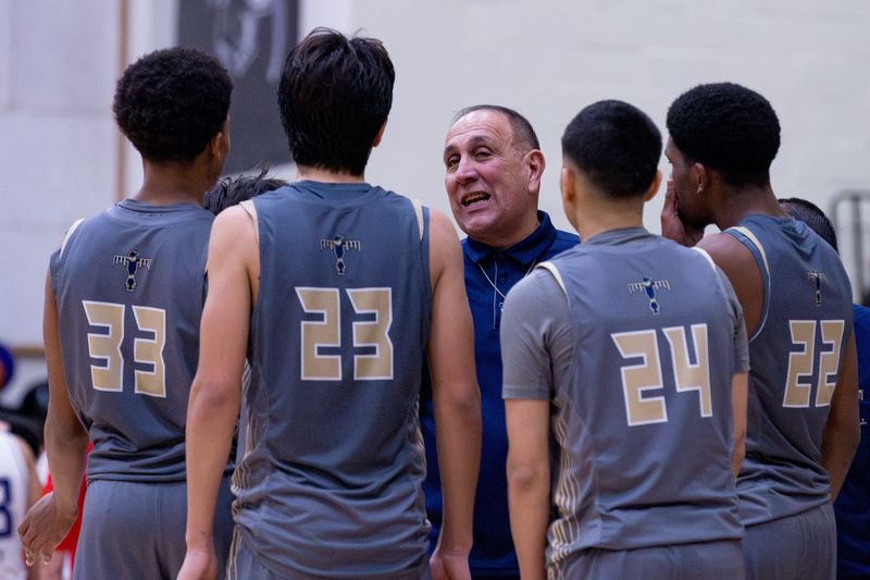 Coronado head boys basketball coach David Ortega talks to his team after halftime during a District 1-6A boys basketball game against Franklin on Friday, Feb. 13, 2026, at Franklin High School in El Paso, Texas.