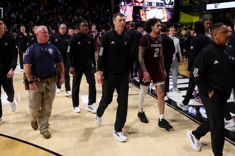 Feb 14, 2026; Nashville, Tennessee, USA; Texas A&M Aggies head coach Bucky McMillan walks off the court against the Vanderbilt Commodores during the second half at Memorial Gymnasium. Mandatory Credit: Steve Roberts-Imagn Images