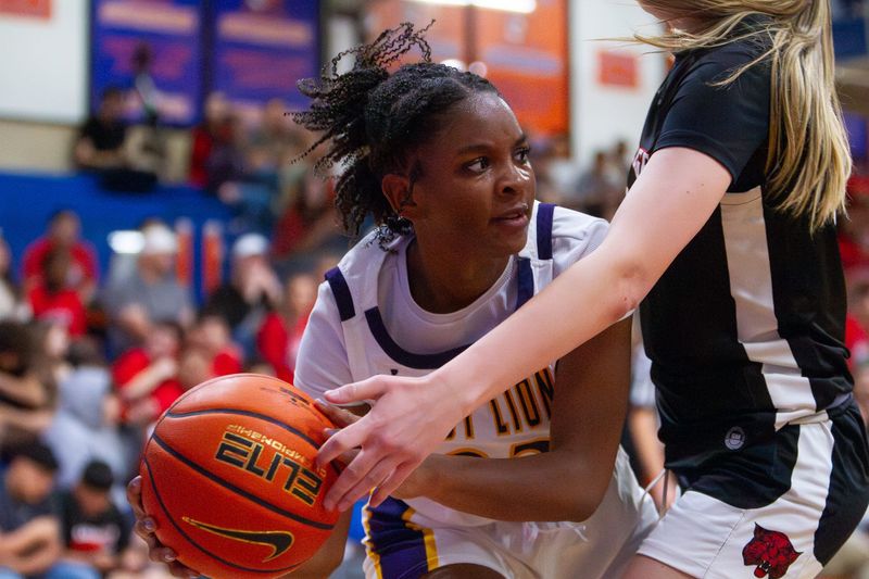 Ozona girls basketball's Aaliyah Renteria (23) grabs a rebound and tries to find and outlet pass in a game against Ballinger at San Angelo Central High School on Monday, Feb. 16,2026.