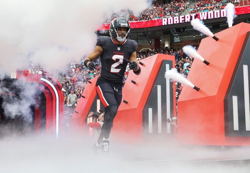 Dec 15, 2024; Houston Texans wide receiver Robert Woods (2) runs onto the field before the game against the Miami Dolphins at NRG Stadium. Mandatory Credit: Troy Taormina-Imagn Images