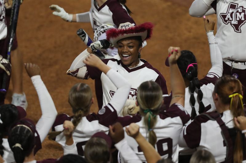 May 8, 2025; Athens, GA, USA; Texas A&M infielder Kennedy Powell (1) reacts to her two-run homer with teammates during a game against South Carolina at Jack Turner Stadium. Mandatory Credit: Mady Mertens-Imagn Images