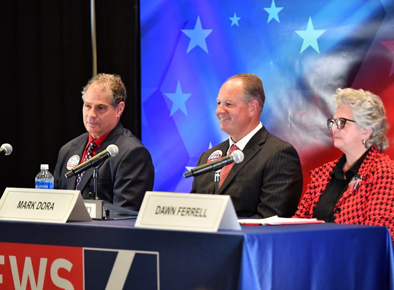 Candidates for Wichita County judge — Rick Hatcher (left), Mark Dora (middle) and Dawn Ferrell (right) — are introduced during the Wichita County Judge Debate on Tuesday at the Multi-Purpose Events Center in Wichita Falls. KAUZ News Channel 6 hosted the live debate to give the three Republican candidates an opportunity to speak on issues. No Democrats are running for the post. Early voting is underway, and Primary Election Day is March 3.