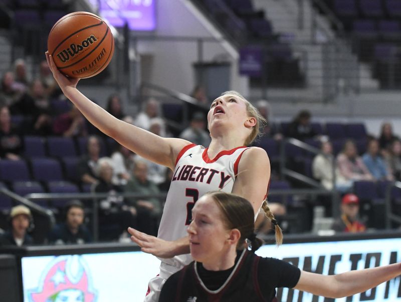 Lubbock-Cooper Liberty's Mikah Henderson shoots against Bridgeport in a Class 4A Division II area-round playoff girls basketball game Thursday, Feb. 19, 2026, at Moody Coliseum in Abilene.