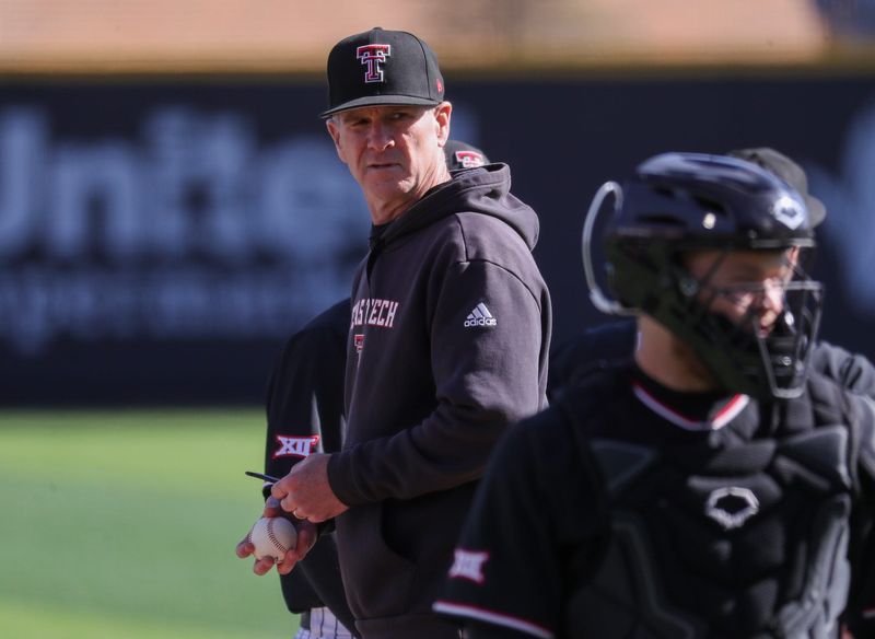 Texas Tech head coach Tim Tadlock stands on the mound during a pitching change against UAlbany during a non-conference baseball game, Friday, Feb. 20, 2026, at Rip Griffin Park.