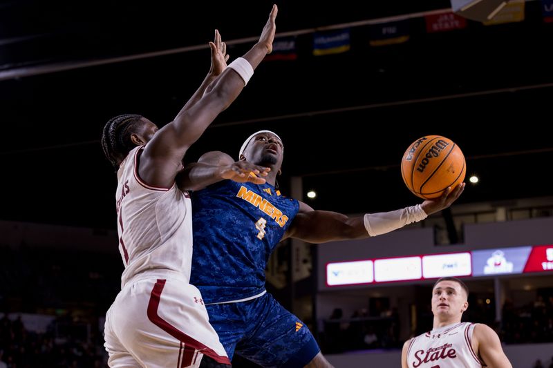 UTEP’s Caleb Blackwell (4) jumps for a layup during a men’s basketball game against NMSU at the Pan American Center in Las Cruces, New Mexico, on Saturday, Feb. 21, 2026.