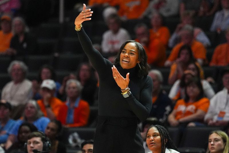 Texas A&M women's basketball coach Joni Taylor gestures during a NCAA basketball game at Thompson-Boling Arena at Food City Center in Knoxville, Tenn., on Feb. 19, 2026.