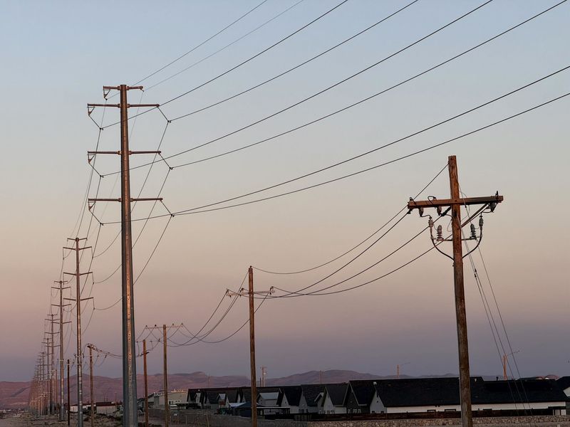 El Paso Electric's proposed 345-kilovolt transmission line would look similar to the 115-kilovolt transmission line, far left, as seen Feb. 19, along Frankie Lane, and connecting to the Caliente electric substation in far East El Paso County. But the 345kV poles are taller.