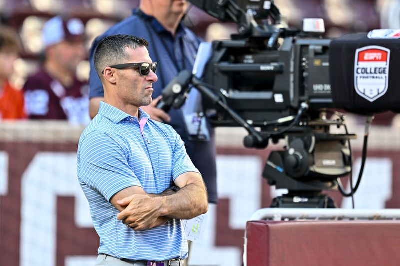 Oct 11, 2025; College Station, Texas, USA; Houston Texans executive vice president and general manager Nick Caserio watches warm up prior to the game between the Texas A&M Aggies and the Florida Gators at Kyle Field. Mandatory Credit: Maria Lysaker-Imagn Images