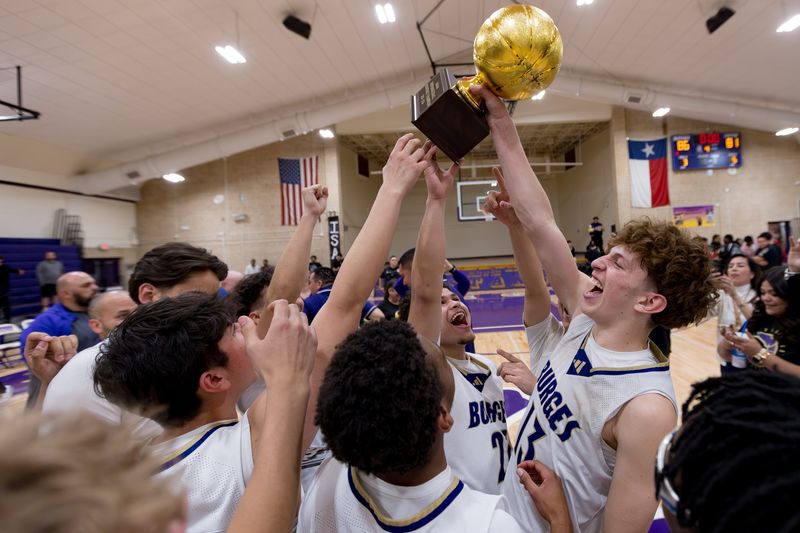 Burges’ Anthony Rubio (11) lifts the trophy as teammates celebrate after defeating Hanks 86-81 in a Class 5A Division I bi-district boys basketball playoff game Tuesday, Feb. 24, 2026, at Burges High School in El Paso, Texas.