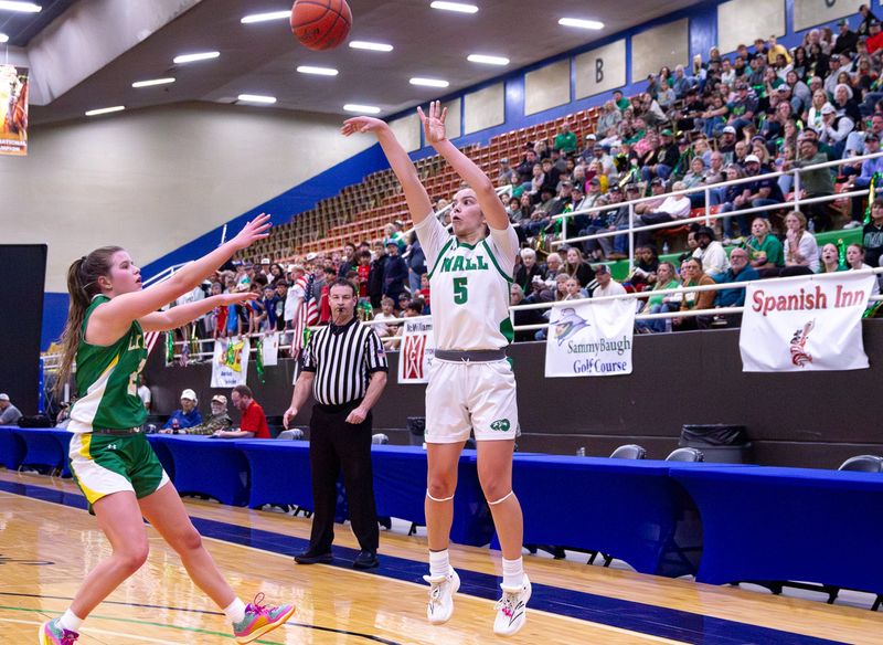 Wall girls basketball's Jewels Johnson (5) attempts a 3-pointer against Idalou at WTC Coliseum in Snyder on Tuesday, Feb. 24, 2026.