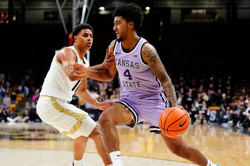 Feb 25, 2026; Boulder, Colorado, USA; Colorado Buffaloes guard Jalin Holland (11) defends on Kansas State Wildcats guard PJ Haggerty (4) in the first half at the CU Events Center. Mandatory Credit: Ron Chenoy-Imagn Images