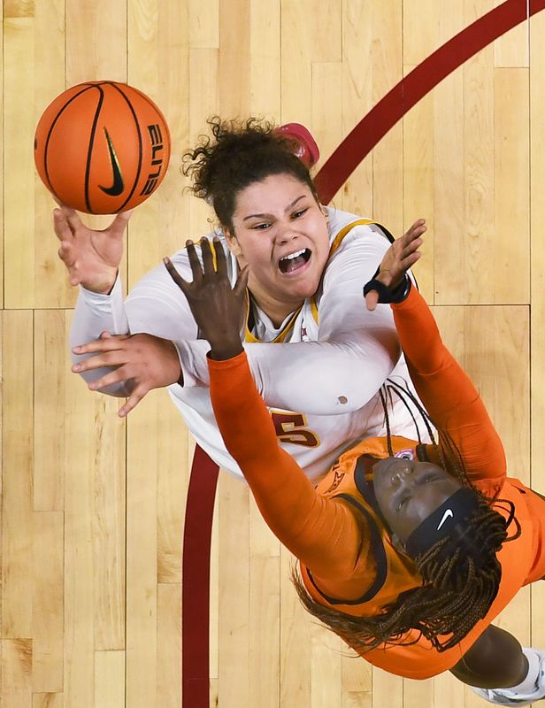 Iowa State Cyclones' center Audi Crooks (55) shoots the ball over Oklahoma State Cowgirls forward Achol Akot (11) during the second quarter in the senior day women basketball at Hilton Coliseum on February. 25, 2026, in Ames, Iowa.