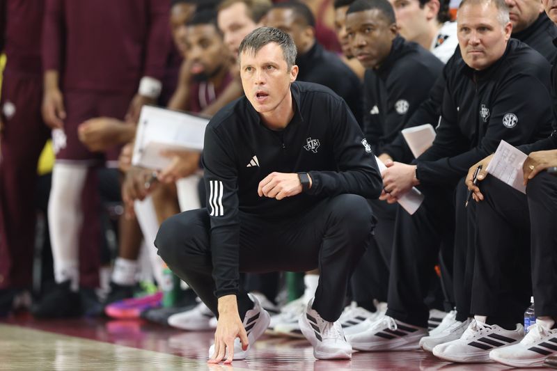 Feb 25, 2026; Fayetteville, Arkansas, USA; Texas A&M Aggies head coach Bucky McMillan looks on against the Arkansas Razorbacks during the first half at Bud Walton Arena. Mandatory Credit: Nelson Chenault-Imagn Images