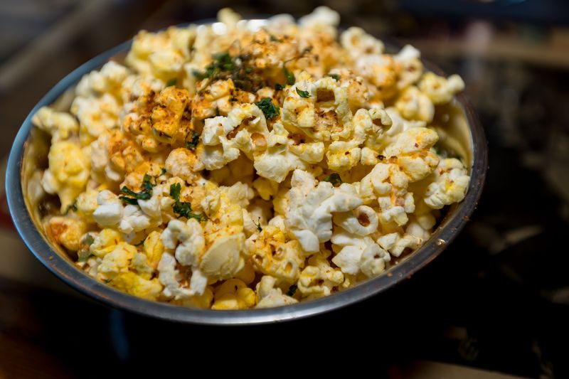 Elote Chili Lime Popcorn is served as a starter during a food tasting event at Flix Brewhouse’s East Side location at 12351 Pellicano Drive on Thursday, Feb. 26, 2026, in El Paso, Texas.