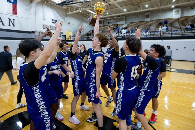 Burges High School celebrates its 74-72 win in a UIL 5A Division II area round boys basketball playoff game against Amarillo Palo Duro on Friday, Feb. 27, 2026, at Odessa Permian High School in Odessa, Texas.