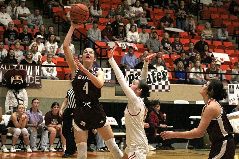 Eula junior Reagan Barr shoots over Hermleigh junior Kolbie Campbell during the Lady Pirates' game against the Lady Cardinals in the regional finals of the 1A DI UIL Playoffs on Thursday, Feb. 26, at Dorothy Garrett Coliseum in Big Spring. Eula won 58-44.