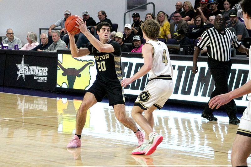 Jayton senior Colt Gentry looks for a pass around Gordon senior Aiden Shank during the Jaybirds' game against the Longhorns in the area round of the 1A DII UIL Boys Basketball Playoffs on Friday, Feb. 27, at ACU's Moody Coliseum in Abilene. Jayton won 47-42 in overtime.