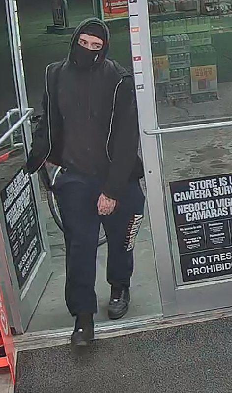 A security camera image shows an unidentified masked man entering during an armed robbery of the Circle K on Rushing Road next to Veterans Park in Northeast El Paso on Feb. 8, 2026.