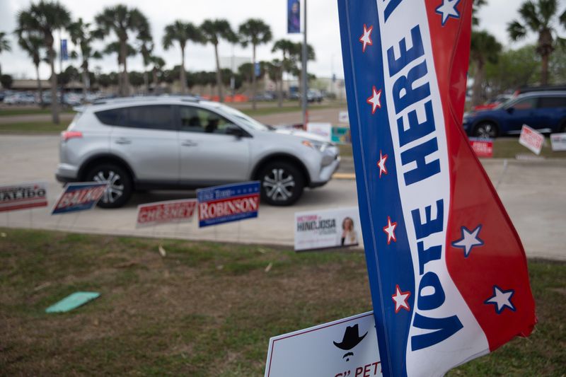 A vehicle heads into the parking lot of the Natural Resources Center at Texas A&M University-Corpus Christi in Corpus Christi, Texas, on Election Day on March 3, 2026.