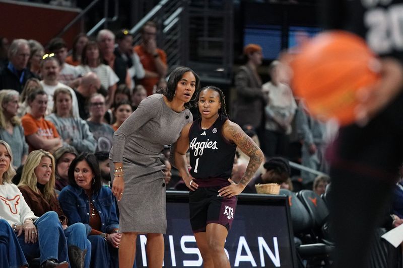 Jan 18, 2026; Austin, Texas, USA; Texas A&M Aggies head coach Joni Taylor talks to guard Ny'Ceara Pryor (1) during the first quarter against the Texas Longhorns at Moody Center. Mandatory Credit: Dustin Safranek-Imagn Images