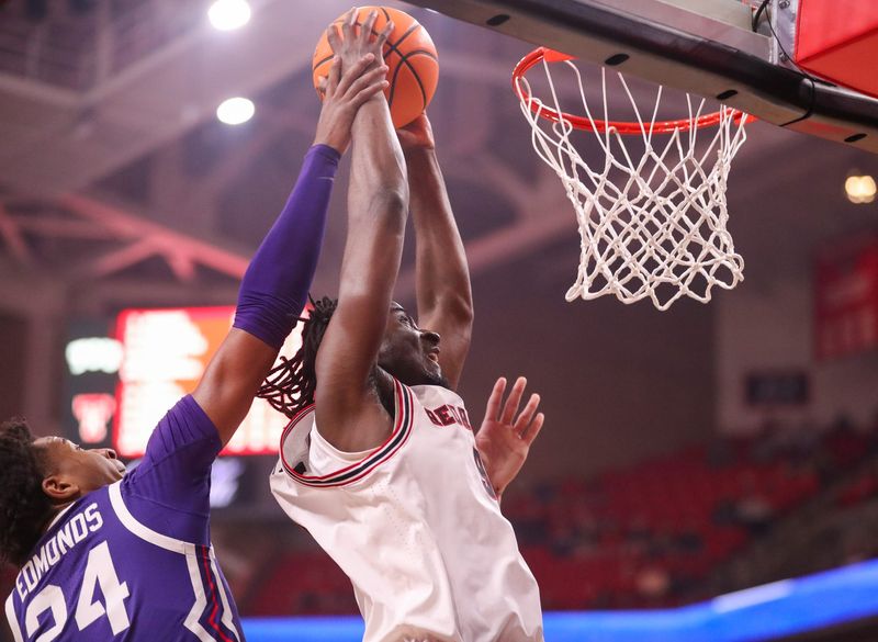Texas Tech's Luke Bamgboye rises for a dunk against TCU during a Big 12 Conference men's basketball game, Tuesday, March 3, 2026, in United Supermarkets Arena.