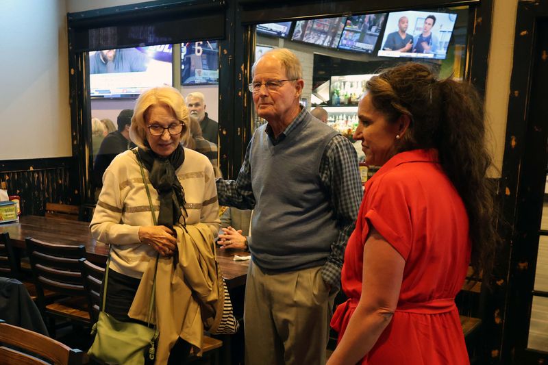 Laura and Joe Street take a moment to visit with Holly Jeffreys during Jeffreys' House District 86 race watch party for the Republican primary at Beef O'Brady's Tuesday evening, March 3.