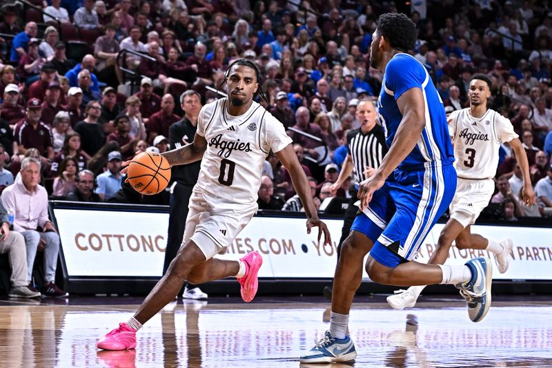 Mar 3, 2026; College Station, Texas, USA; Texas A&M Aggies guard Marcus Hill (0) dribbles the ball against the Kentucky Wildcats during the second half at Reed Arena. Mandatory Credit: Maria Lysaker-Imagn Images