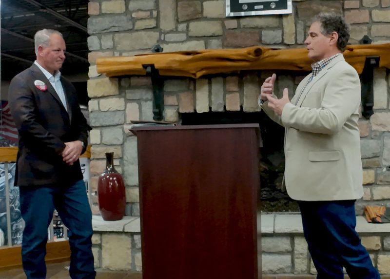 Mark Dora, left, faced Rick Hatcher March 6 in a candidates forum. The men are running in a Republican Party primary runoff election on May. 26.