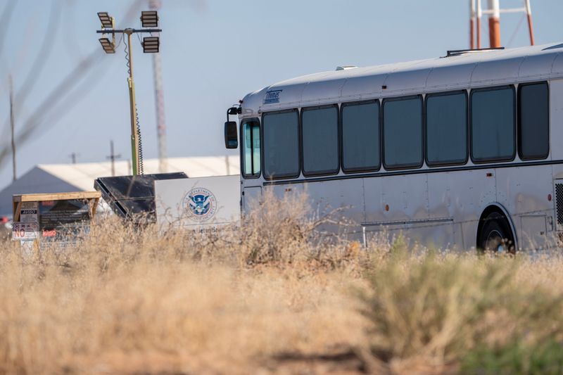 Camp East Montana is photographed Friday, March 6, 2026, in El Paso, Texas, as a bus enters the detention center. Employees of Akima Global Services, LLC — the security subcontractor at the facility — were told in internal messages that reports of a possible closure were not true, despite a Washington Post story earlier in the week reporting that federal officials were considering shutting it down, according to communications shared with the El Paso Times.