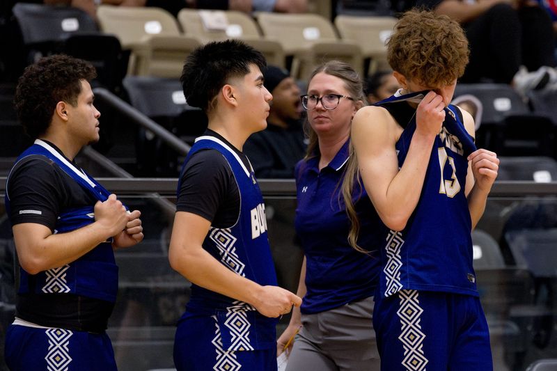 Burges players walk off the court after their loss in the Class 5A Division II regional final against Mansfield Summit on Friday, March 6, 2026, at Lamesa High School in Lamesa, Texas.