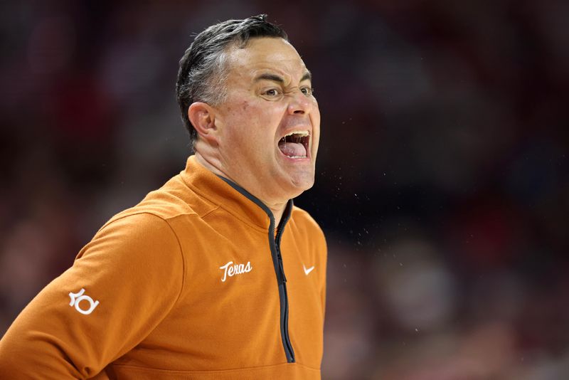 Mar 4, 2026; Fayetteville, Arkansas, USA; Texas Longhorns head coach Sean Miller during the first
 half against the Arkansas Razorbacks at Bud Walton Arena. Arkansas won 105-85. Mandatory Credit: Nelson Chenault-Imagn Images